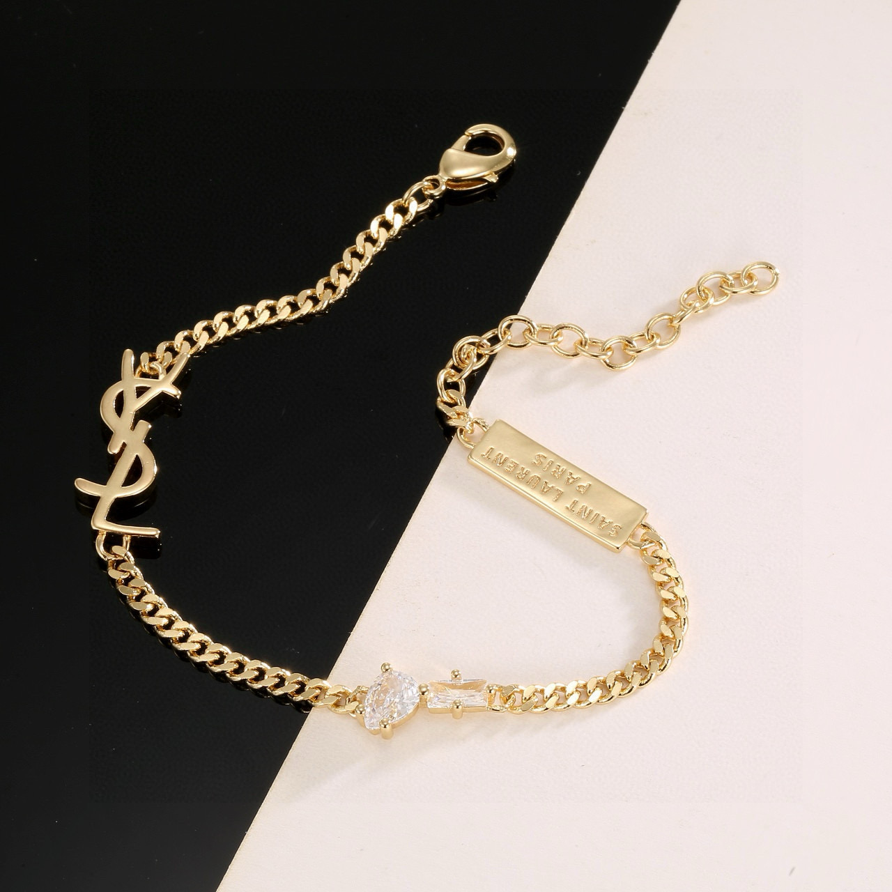 Saint Laurent YSL 1961 Logo Tag Chain Bracelet bracelet silver-tone metal with clear cubic zirconia stones 18cm with 5cm extension