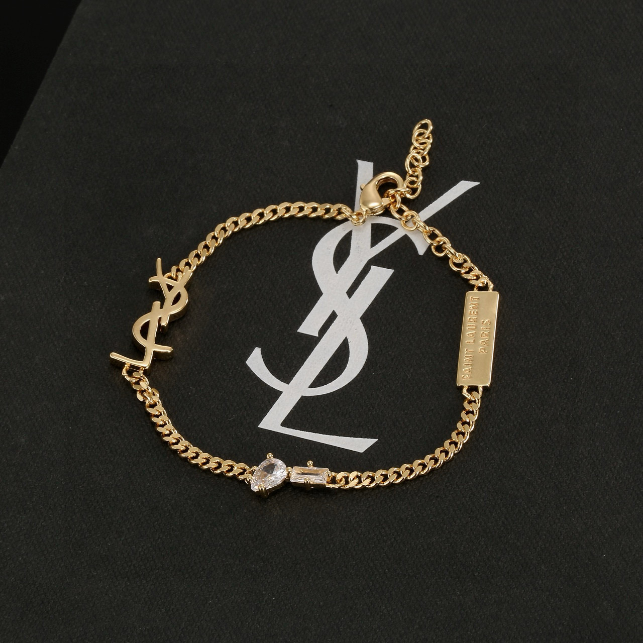 Saint Laurent YSL 1961 Logo Tag Chain Bracelet bracelet silver-tone metal with clear cubic zirconia stones 18cm with 5cm extension