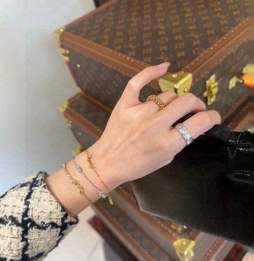 Saint Laurent Cassandre YSL Monogram Crystal Chain Bracelet bracelet Gold-tone metal with clear faceted crystals 16cm with 3cm extender