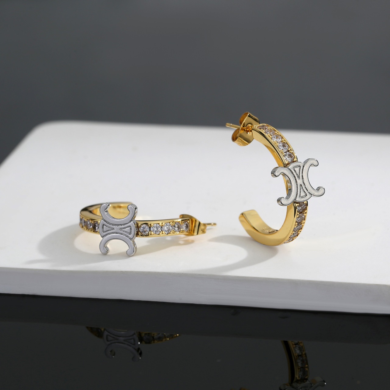 Celine Triomphe earrings Two-tone gold and silver metal with clear crystal accents 20mm hoop diameter