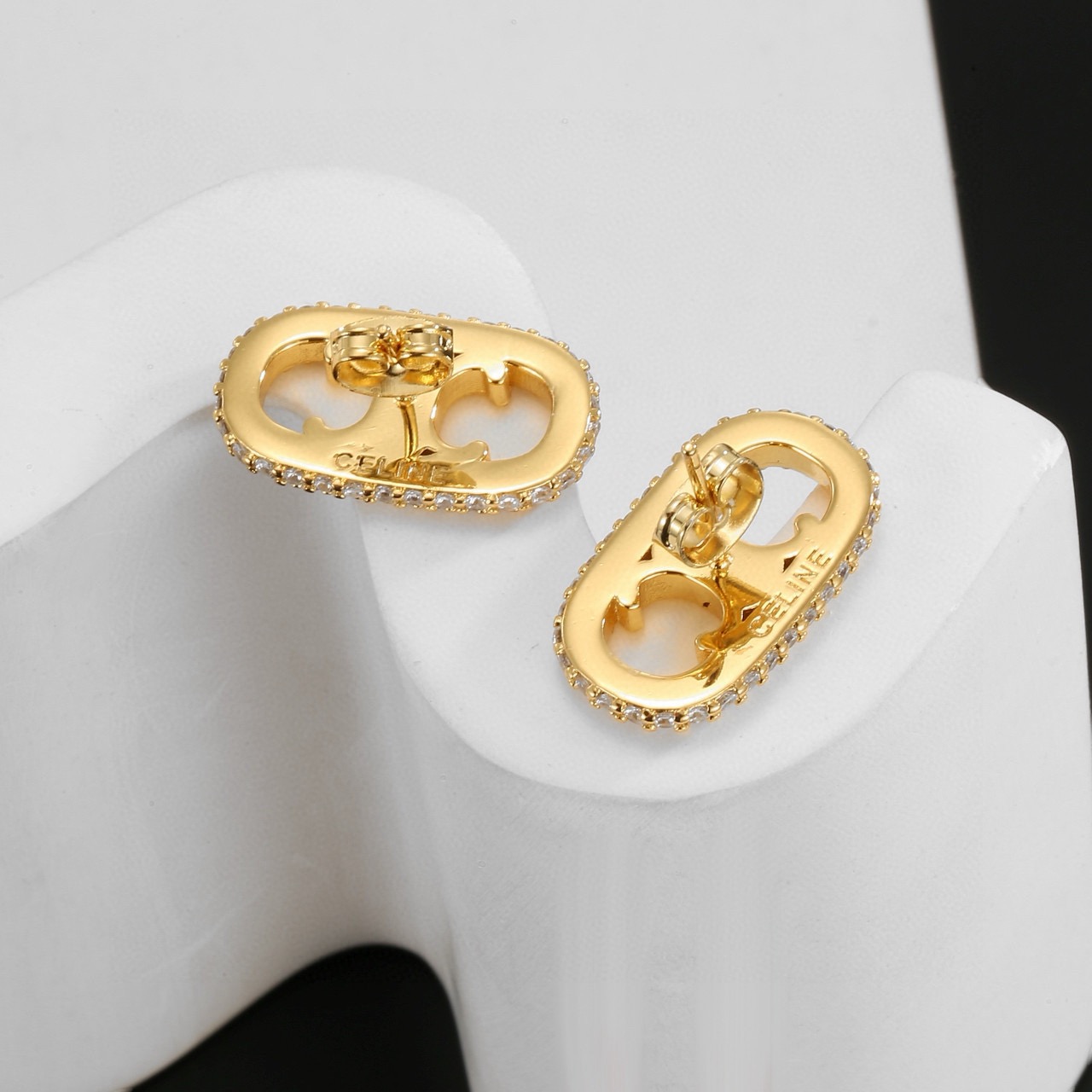 Celine Triomphe Crystal Oval Stud Earrings earrings gold-tone metal with clear crystal accents 1 5cm length