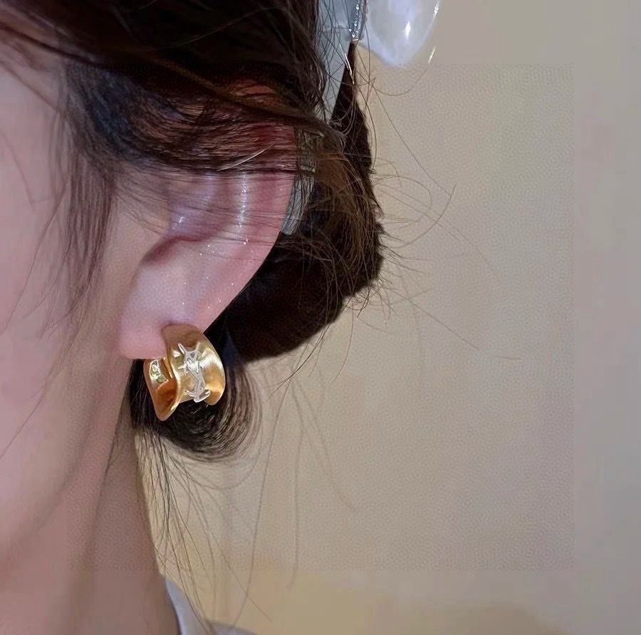 Saint Laurent Cassandre Wavy Hoop earrings gold-tone metal with silver-tone logo 2cm diameter