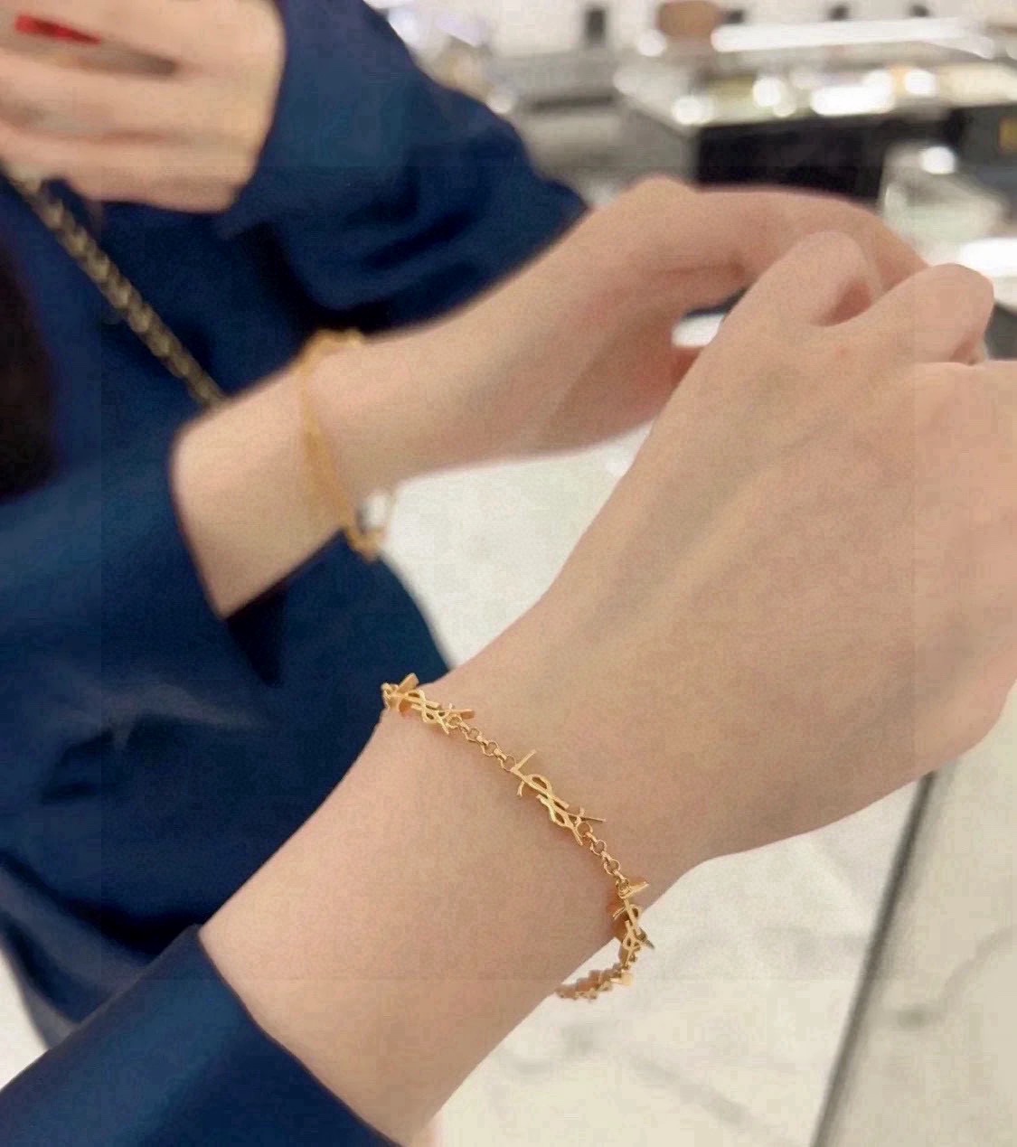 Saint Laurent Cassandre YSL Monogram bracelet gold-tone metal no accent stones 45cm