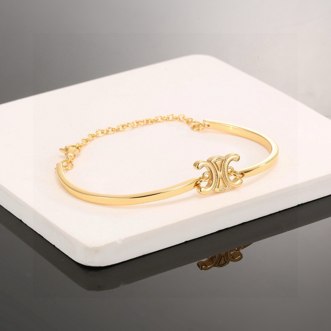 Celine Triomphe bracelet gold tone metal 17cm adjustable