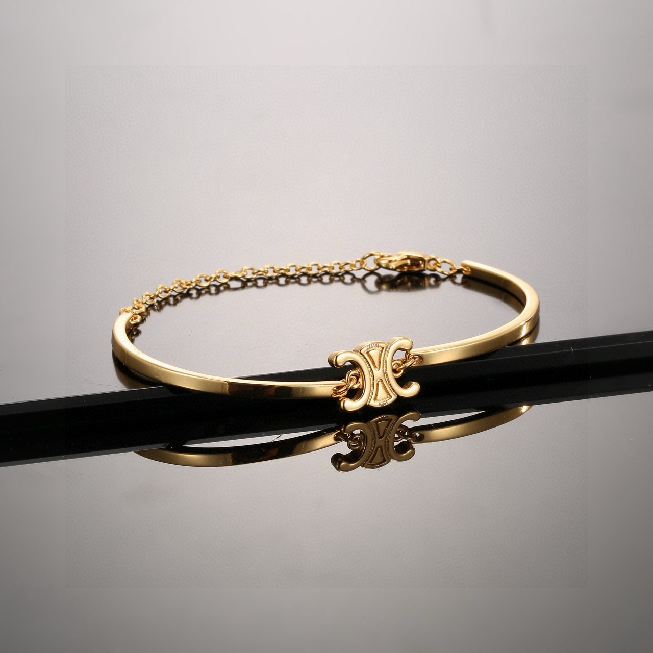 Celine Triomphe bracelet gold tone metal 17cm adjustable