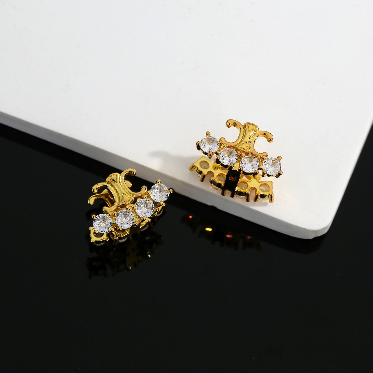 Celine Triomphe Crystal Stud Earrings earrings gold-tone metal with clear faceted crystals 1 2cm width per earring