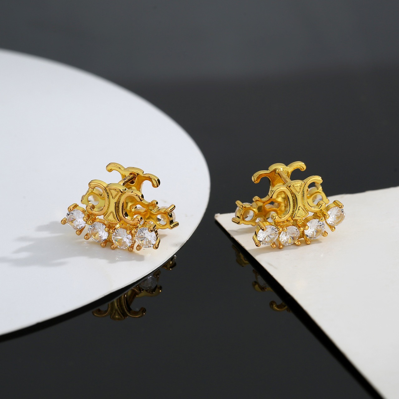 Celine Triomphe Crystal Stud Earrings earrings gold-tone metal with clear faceted crystals 1 2cm width per earring
