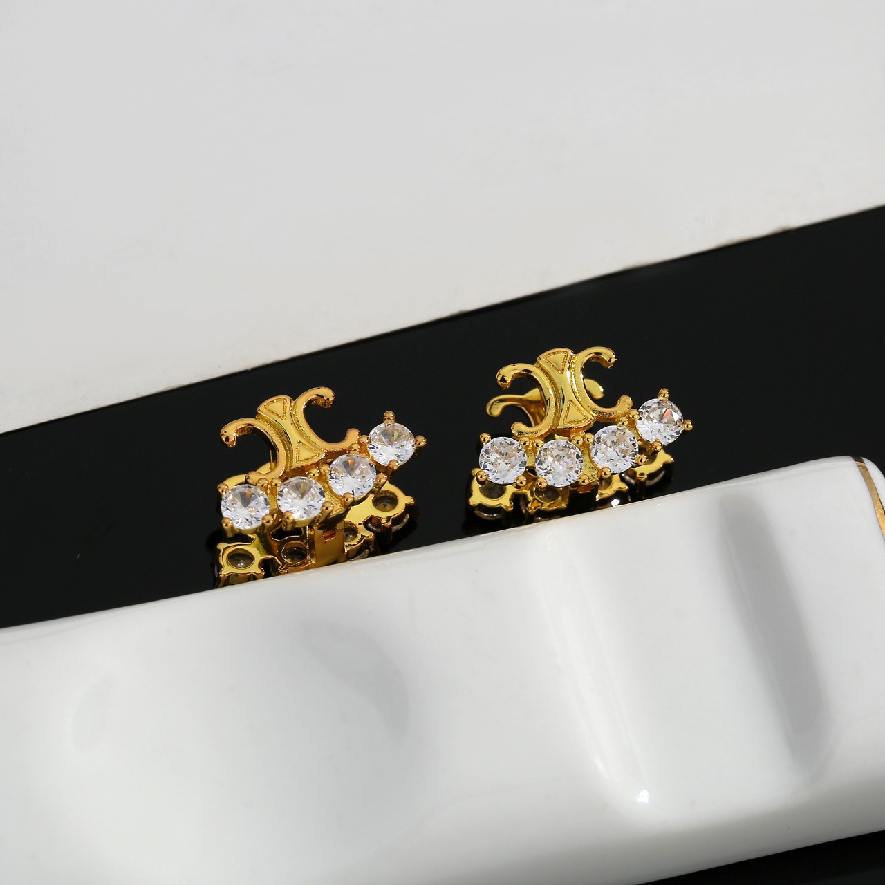 Celine Triomphe Crystal Stud Earrings earrings gold-tone metal with clear faceted crystals 1 2cm width per earring