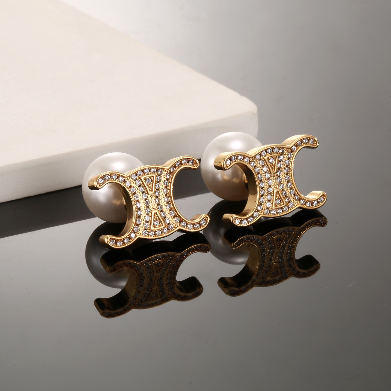 Celine Triomphe Pearl Stud Earrings earrings gold-tone metal clear crystal accents white pearl 1 5cm length