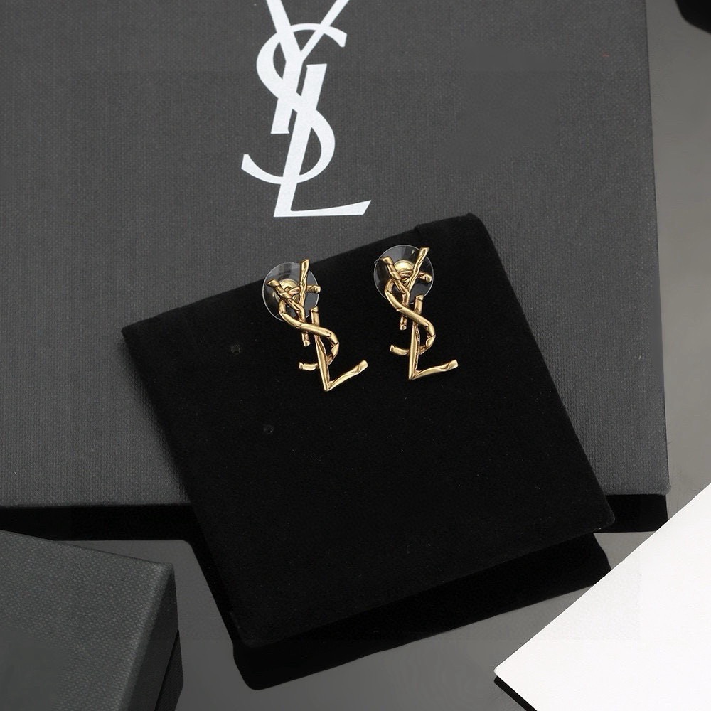 Saint Laurent Cassandre Twisted Monogram earrings antique gold tone metal no gemstones 2 2cm length