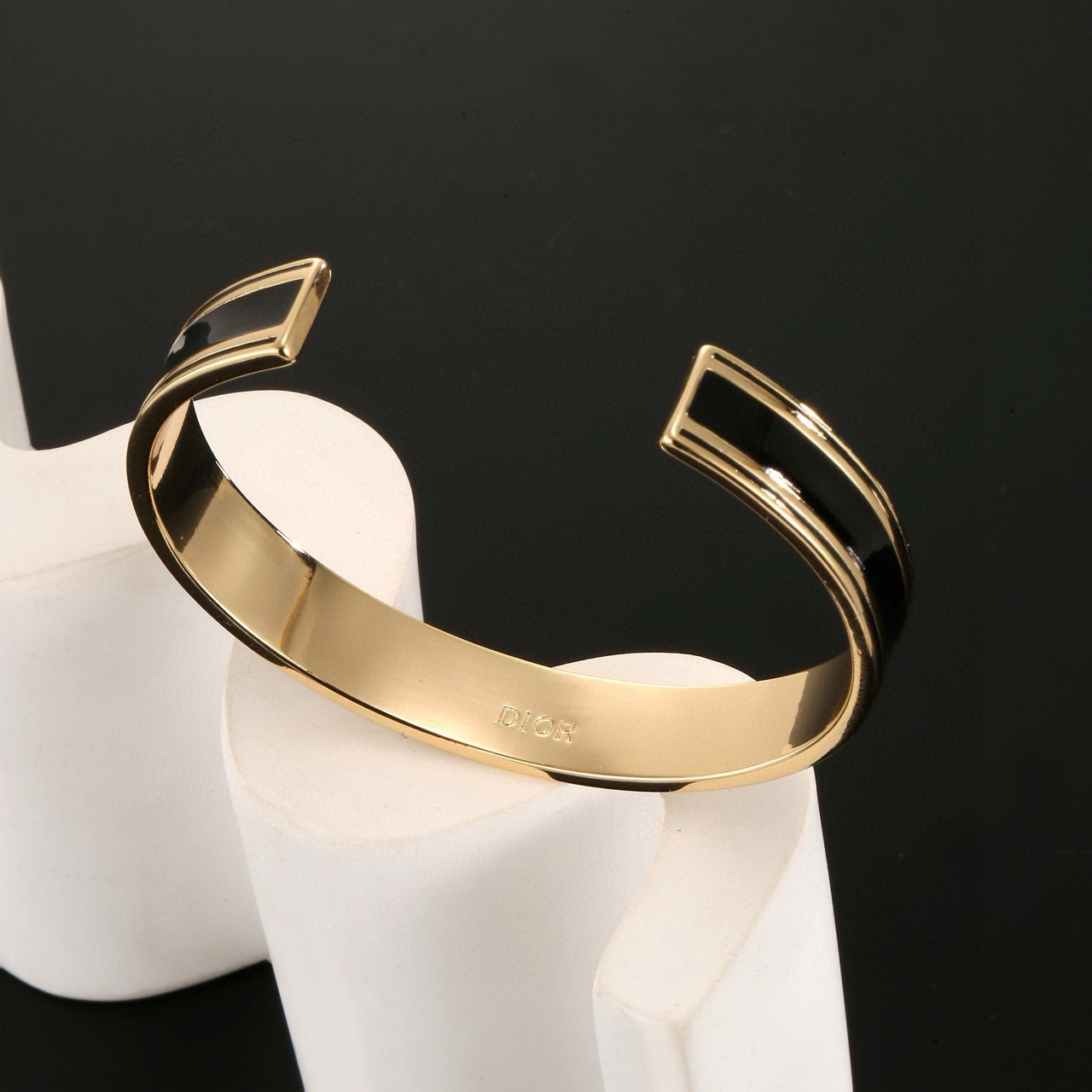 Dior Christian Dior Star Logo Cuff bracelet gold-tone metal with black enamel 17cm inner circumference