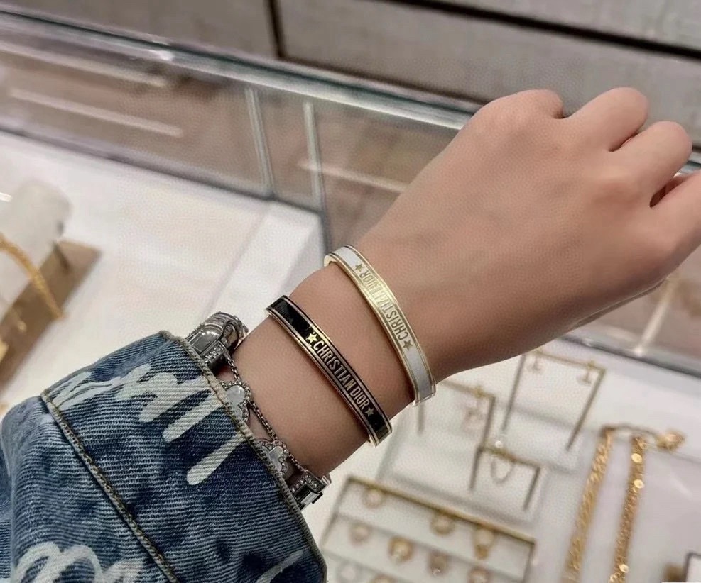 Dior Christian Dior Code Star Cuff bracelet gold-tone metal with white enamel 17cm inner circumference