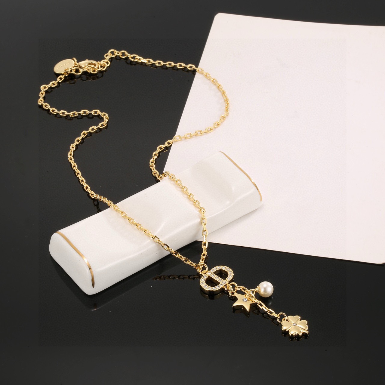Dior Petit CD Lucky Charms necklace gold-tone metal white faux pearl clear crystal accents 42cm with 5cm extender