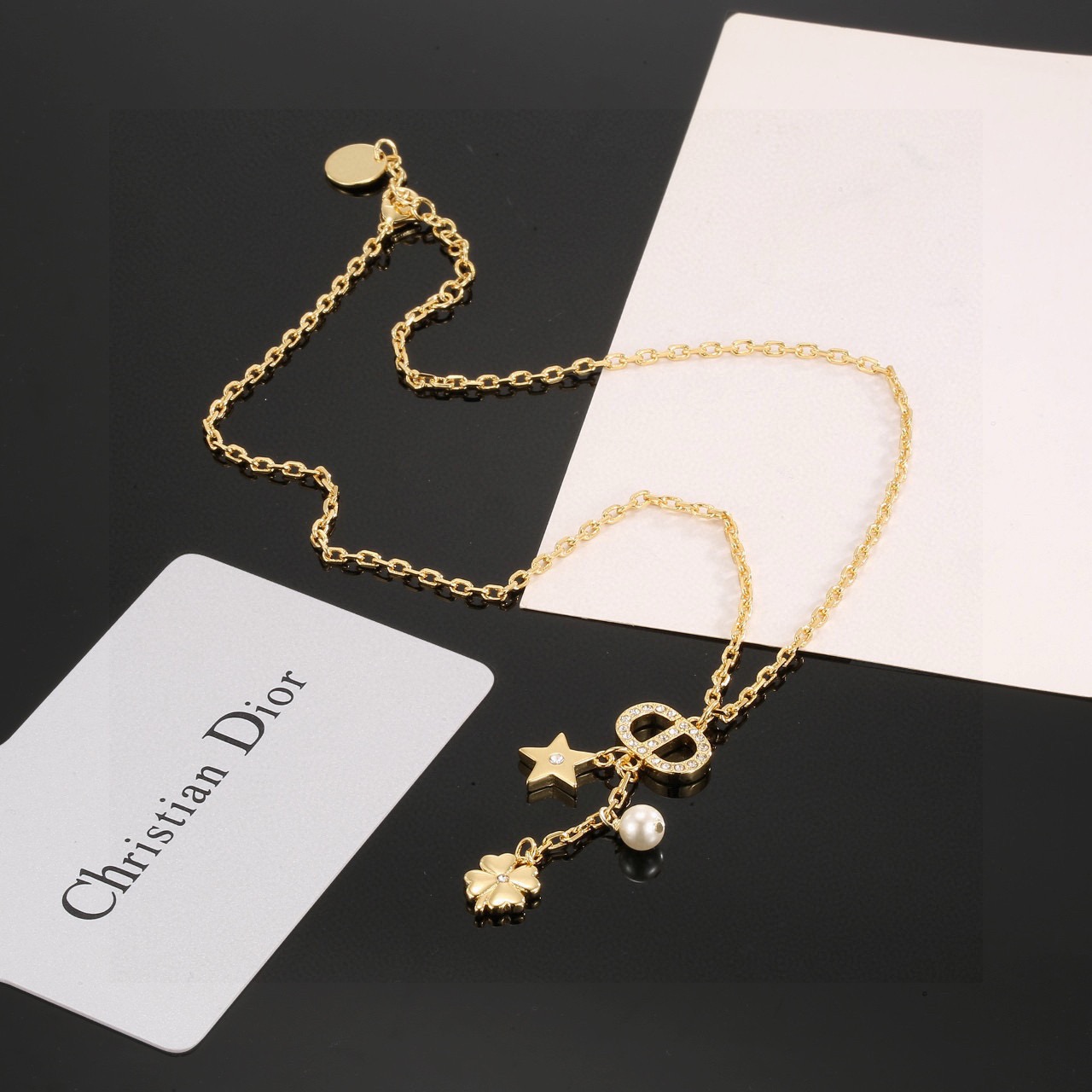 Dior Petit CD Lucky Charms necklace gold-tone metal white faux pearl clear crystal accents 42cm with 5cm extender