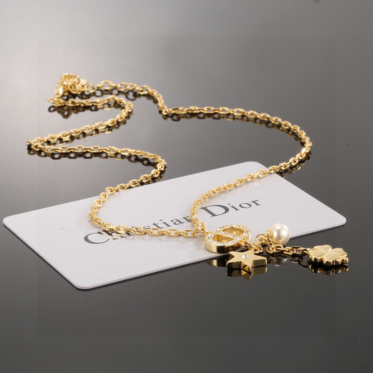 Dior Petit CD Lucky Charms necklace gold-tone metal white faux pearl clear crystal accents 42cm with 5cm extender