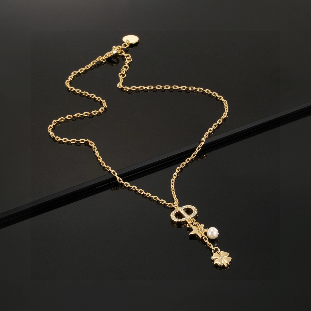 Dior Petit CD Lucky Charms necklace gold-tone metal white faux pearl clear crystal accents 42cm with 5cm extender