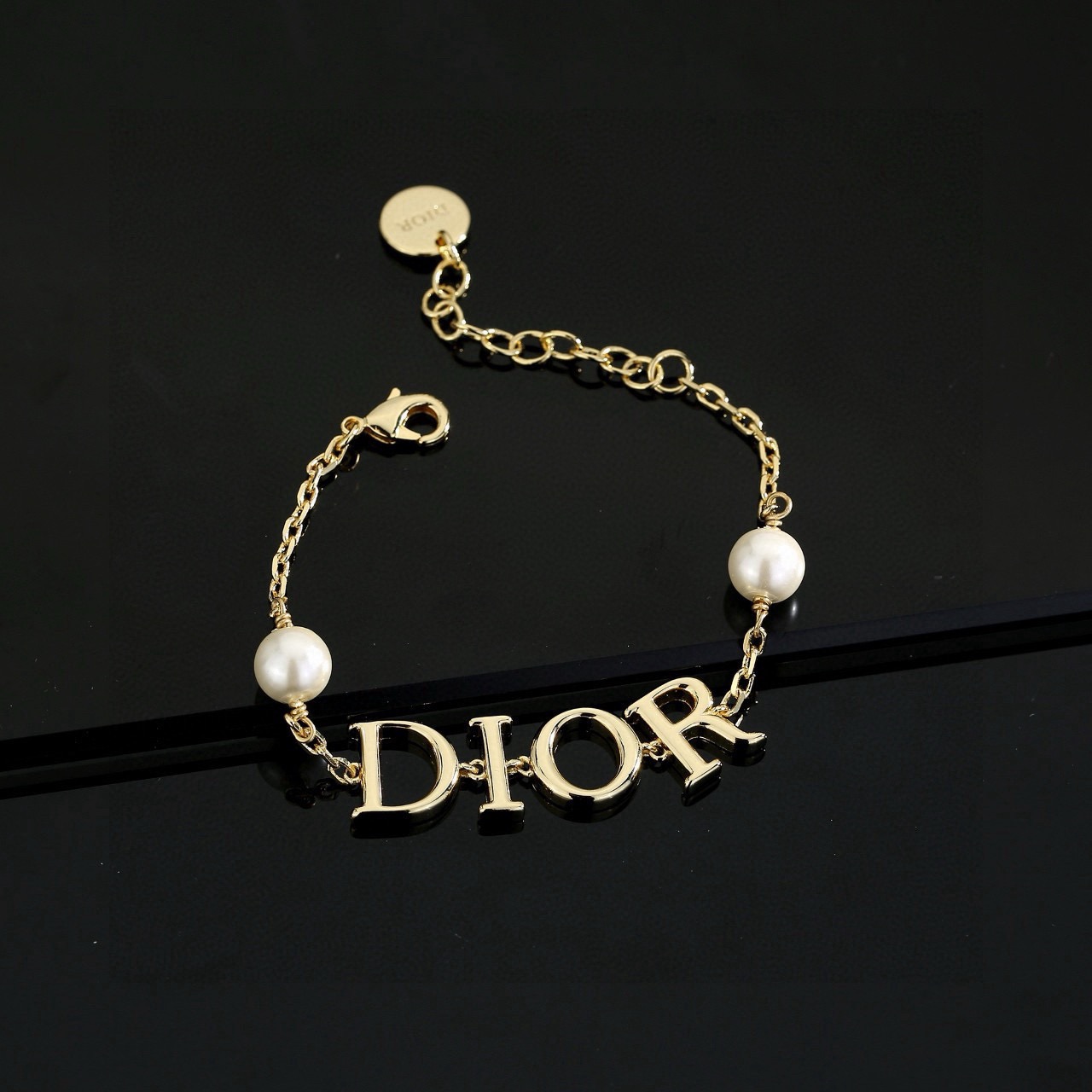 Dior Diorcd bracelet gold-tone metal with white faux pearls 18cm