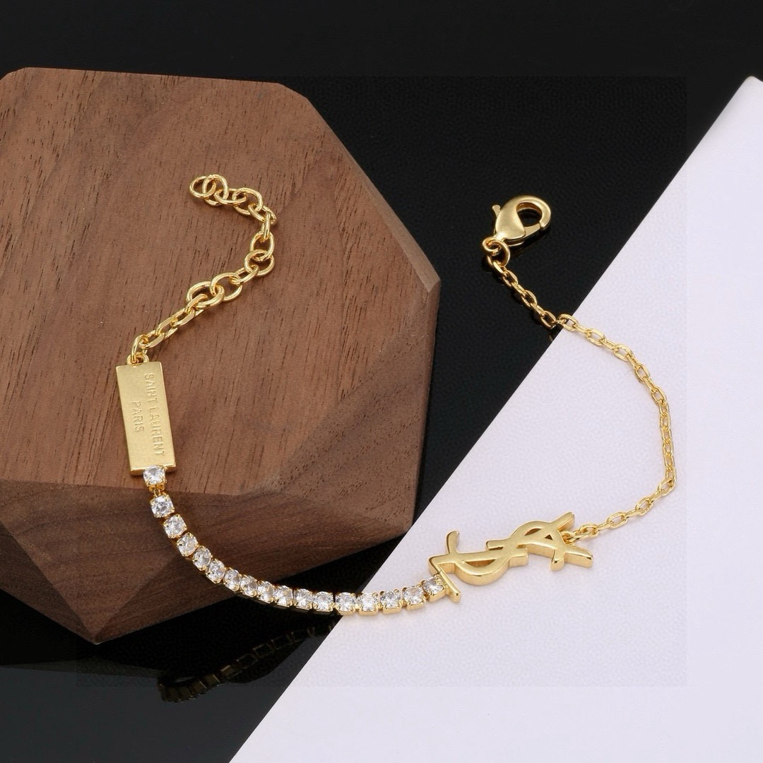Saint Laurent Cassandre YSL Monogram Crystal Chain Bracelet bracelet Gold-tone metal with clear faceted crystals Silver-tone metal with clear faceted crystals 16cm with 3cm extender