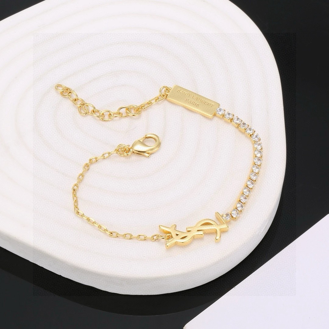 Saint Laurent Cassandre YSL Monogram Crystal Chain Bracelet bracelet Gold-tone metal with clear faceted crystals Silver-tone metal with clear faceted crystals 16cm with 3cm extender