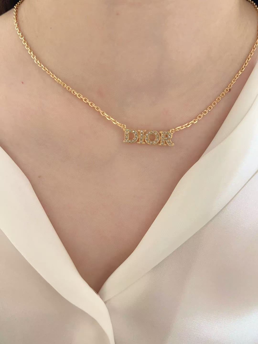 Dior DIOR Logo Crystal Pendant necklace gold-tone metal with clear crystal accents 42cm with 5cm extender