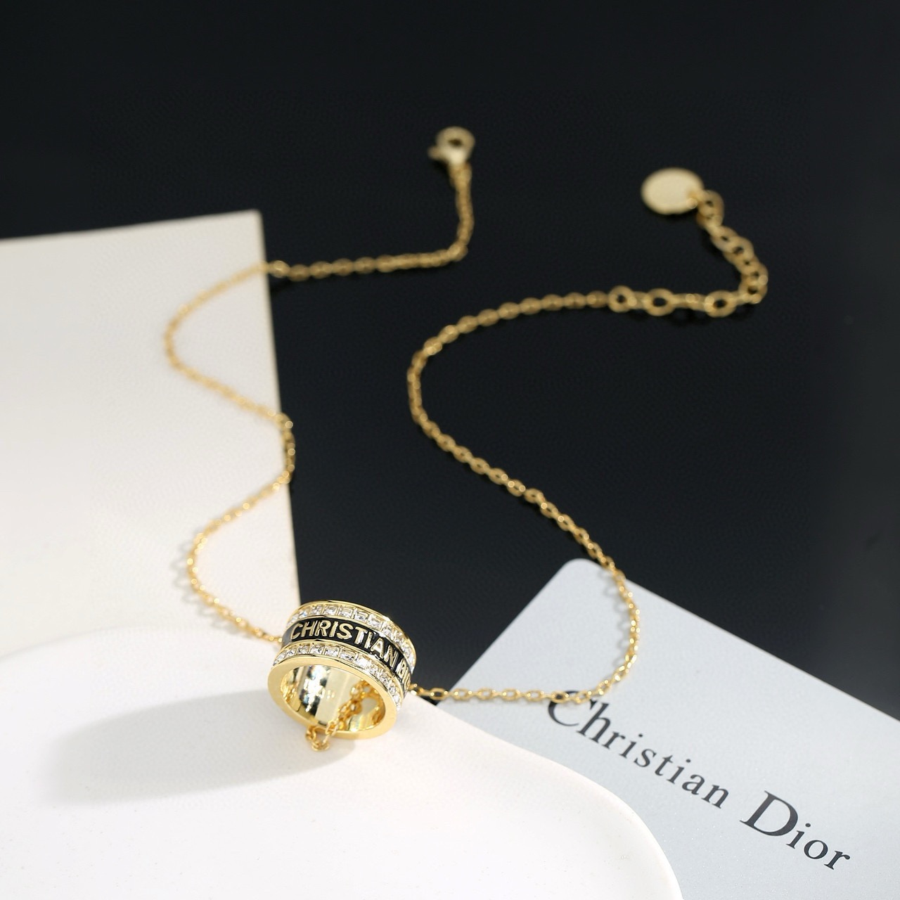 Dior JaDior Christian Dior Code Ring Pendant necklace gold-tone metal with clear crystal accents available with black enamel or white enamel lettering 42cm with 5cm extender