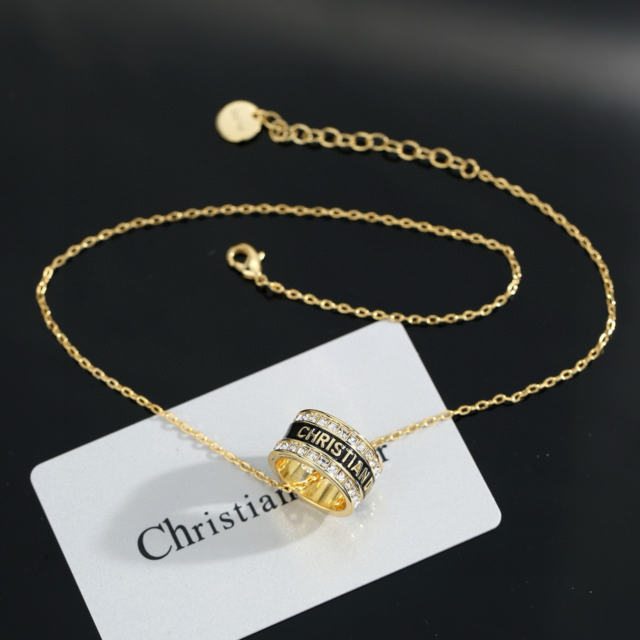 Dior JaDior Christian Dior Code Ring Pendant necklace gold-tone metal with clear crystal accents available with black enamel or white enamel lettering 42cm with 5cm extender