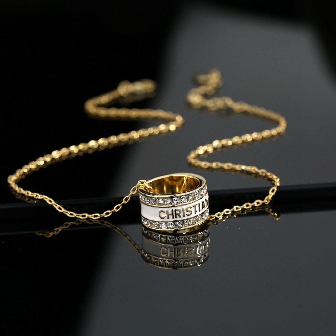 Dior JaDior Christian Dior Code Ring Pendant necklace gold-tone metal with clear crystal accents available with black enamel or white enamel lettering 42cm with 5cm extender