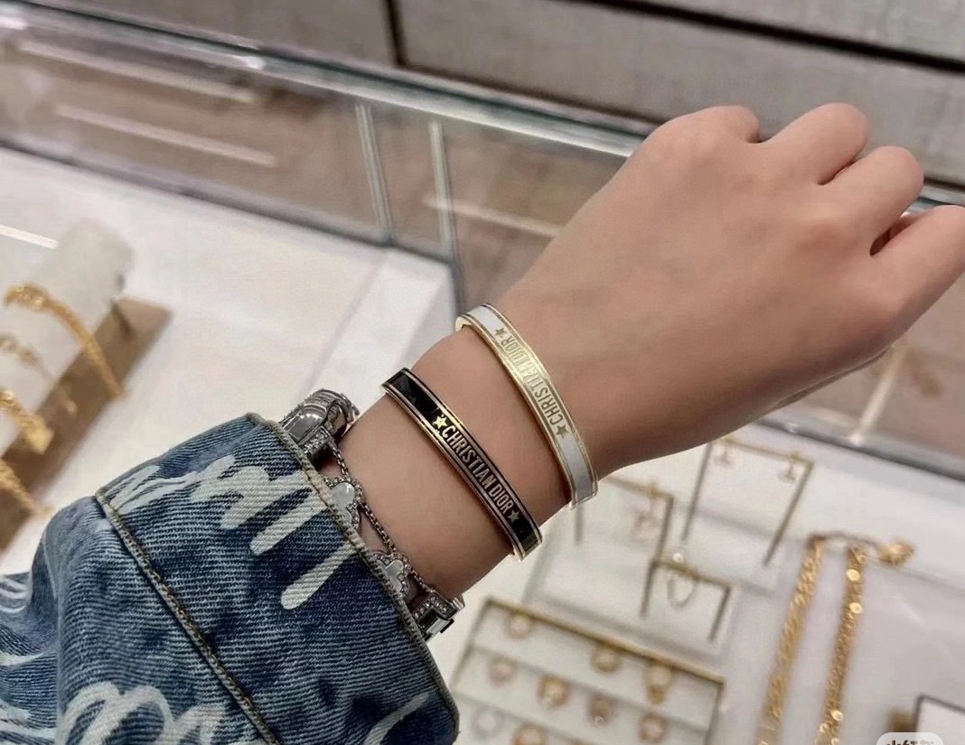 Dior Christian Dior Code Star Cuff bracelet gold-tone metal with black enamel 17cm inner circumference