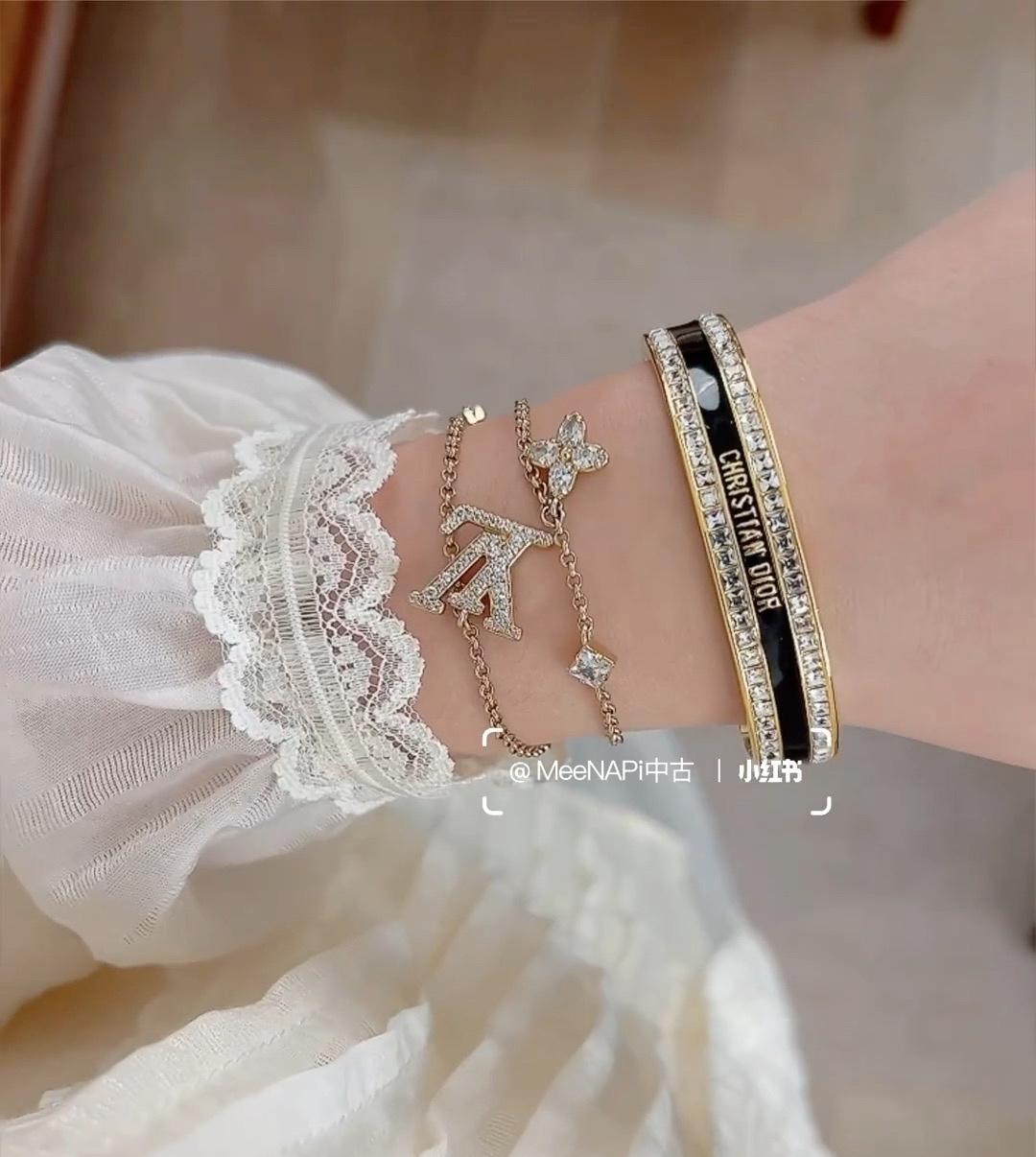Dior Christian Dior Night Code Cuff bracelet Gold-tone metal with clear crystal accents available with black or white enamel inlay 17cm inner circumference