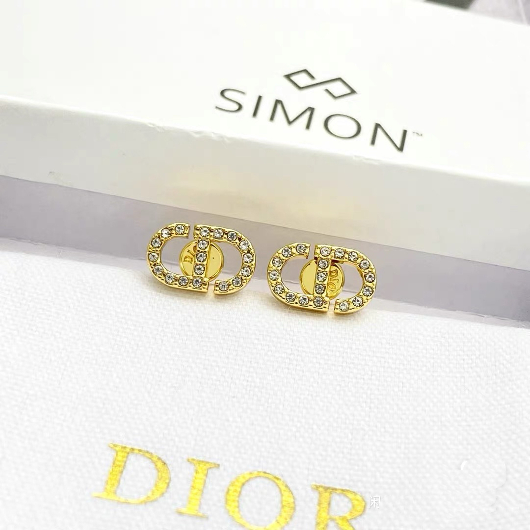 Dior Petit CD earrings gold-tone metal with clear white crystal accents 1 2cm width per stud