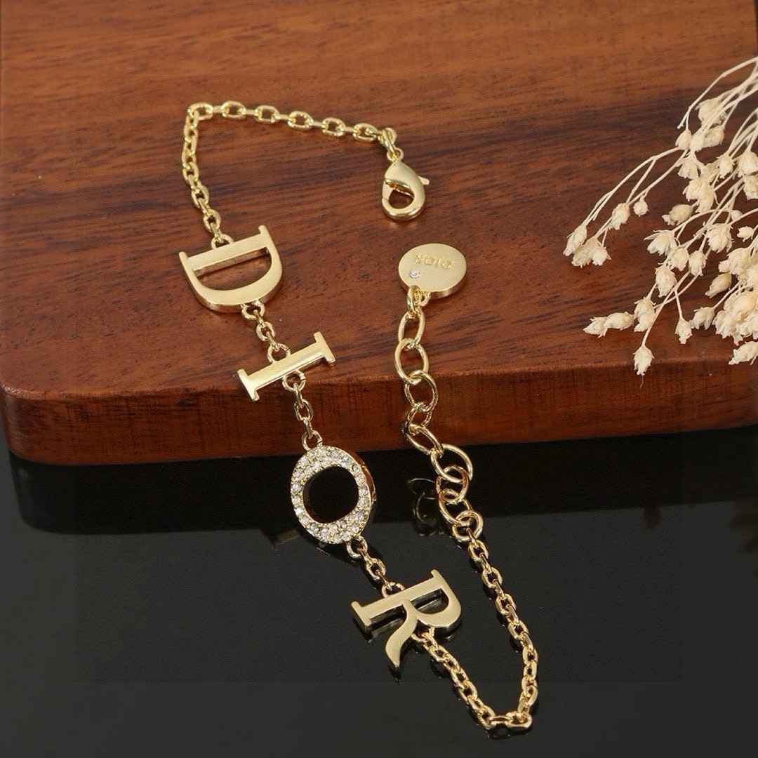 Dior JADIOR Dio r evolution Letter Charm necklace Gold-tone metal with clear crystal pave on the O letter charm 42cm with 5cm extender