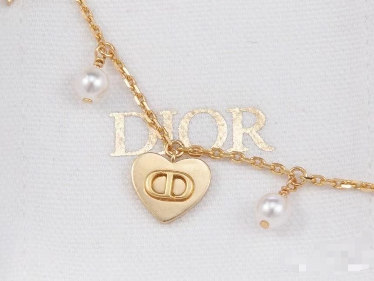 Dior CD Heart Star Pearl Charm Bracelet bracelet Gold-tone metal with white faux pearl accents 17cm