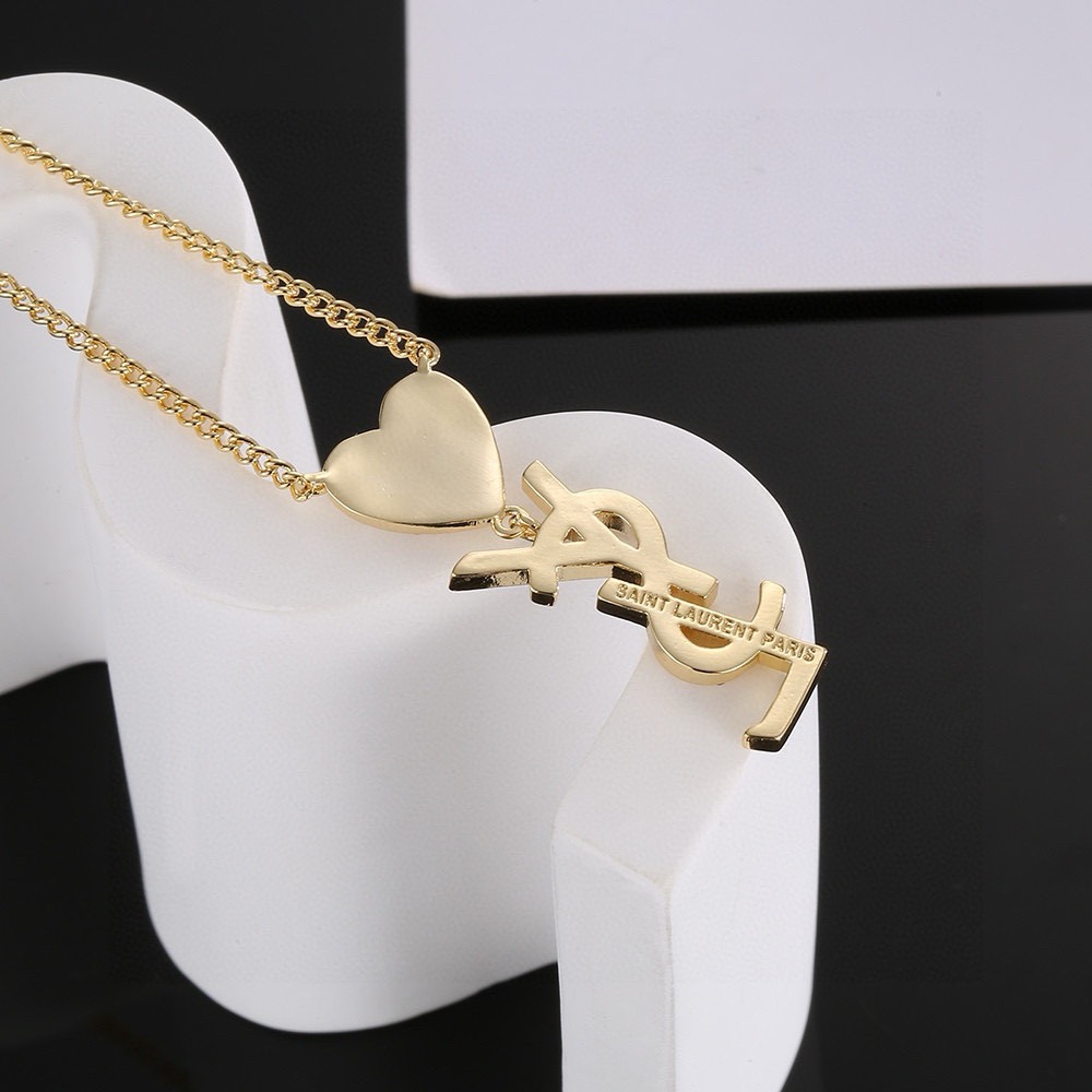 Saint Laurent YSL Monogram Heart Crystal Pendant necklace gold-tone metal with clear crystal accents 45cm with 5cm extender