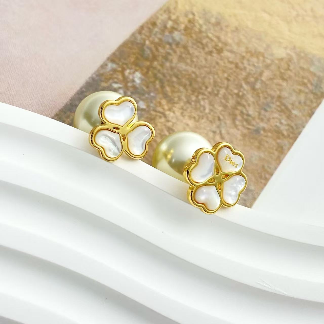 Dior DiorAB Clover Pearl Stud Earrings earrings gold-tone metal white mother-of-pearl cream white resin pearl 1 2cm diameter pearl 1cm clover front