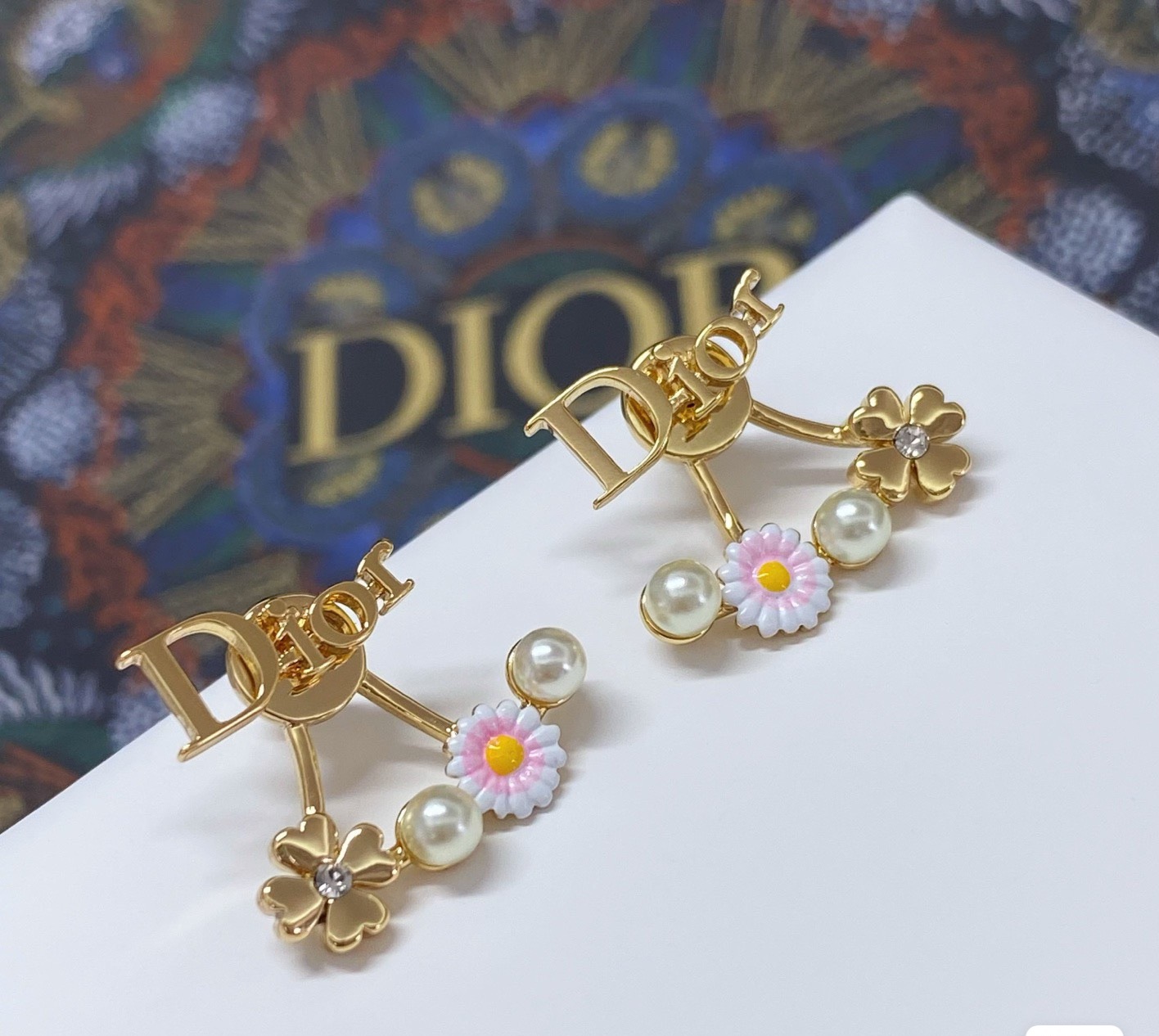 Dior Dio r evolution Daisy Clover Ear Jacket earrings Gold-tone metal white faux pearls pink and white enamel daisy with yellow center clear crystal accent on clover charm One Size post style 1 8cm drop length