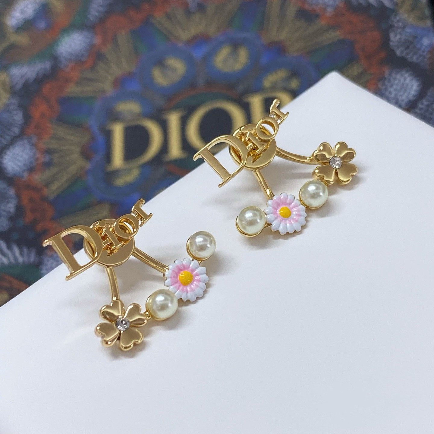 Dior Dio r evolution Daisy Clover Ear Jacket earrings Gold-tone metal white faux pearls pink and white enamel daisy with yellow center clear crystal accent on clover charm One Size post style 1 8cm drop length