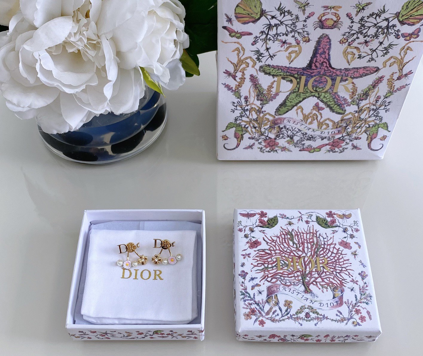 Dior Dio r evolution Daisy Clover Ear Jacket earrings Gold-tone metal white faux pearls pink and white enamel daisy with yellow center clear crystal accent on clover charm One Size post style 1 8cm drop length