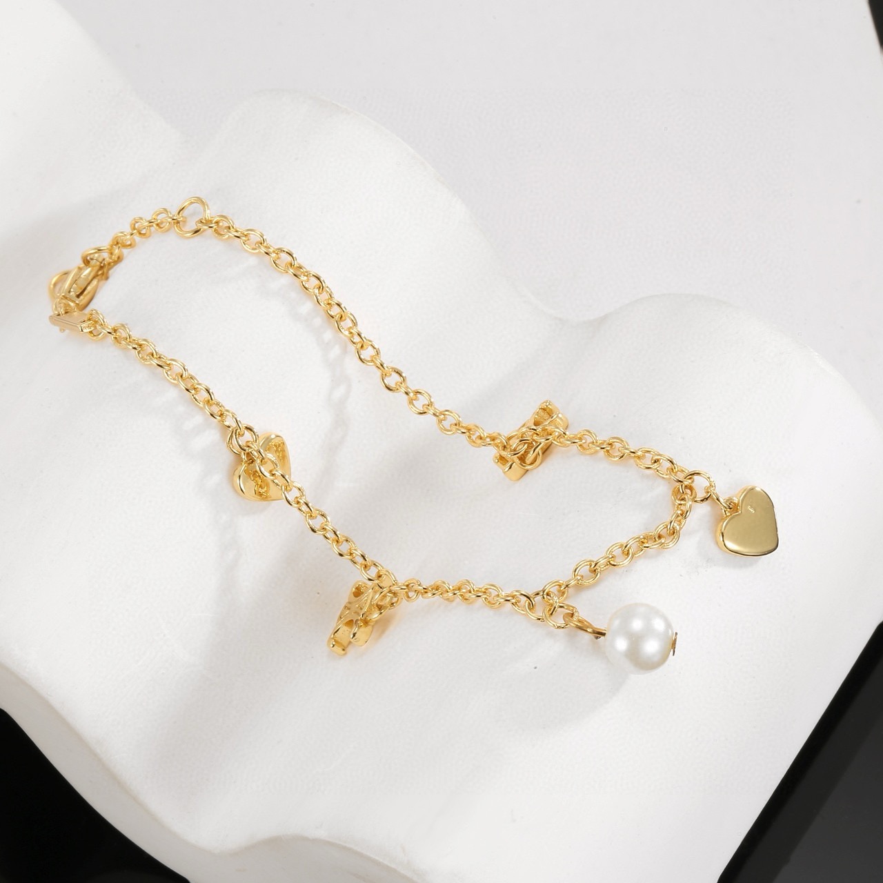 Celine Triomphe Heart Pearl Charm Bracelet bracelet gold-tone metal with white pearl 18cm with 3cm extender