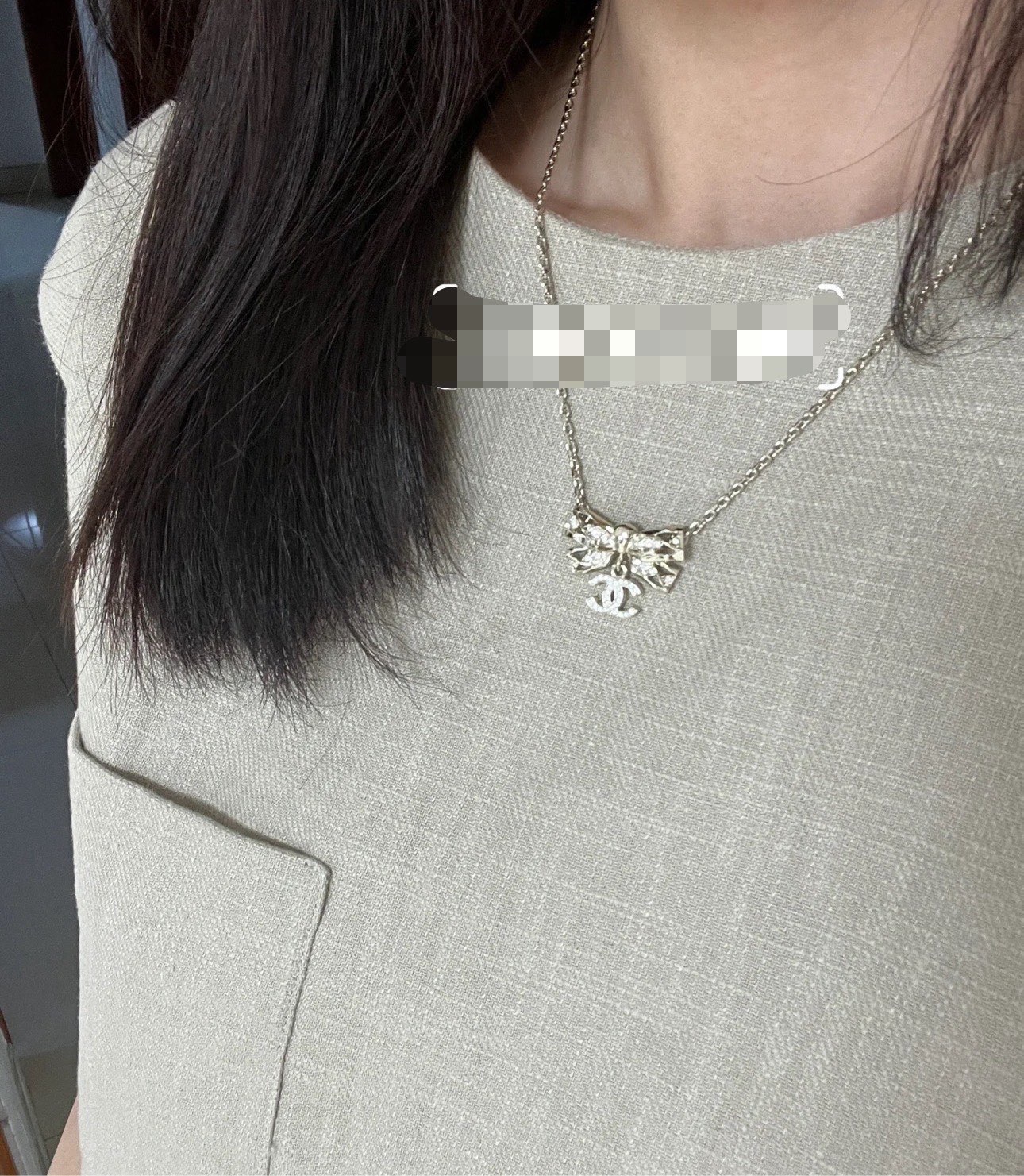 Chanel Crystal Bow CC Pendant Necklace necklace Light gold tone metal with clear crystal accents 42cm with 5cm extender