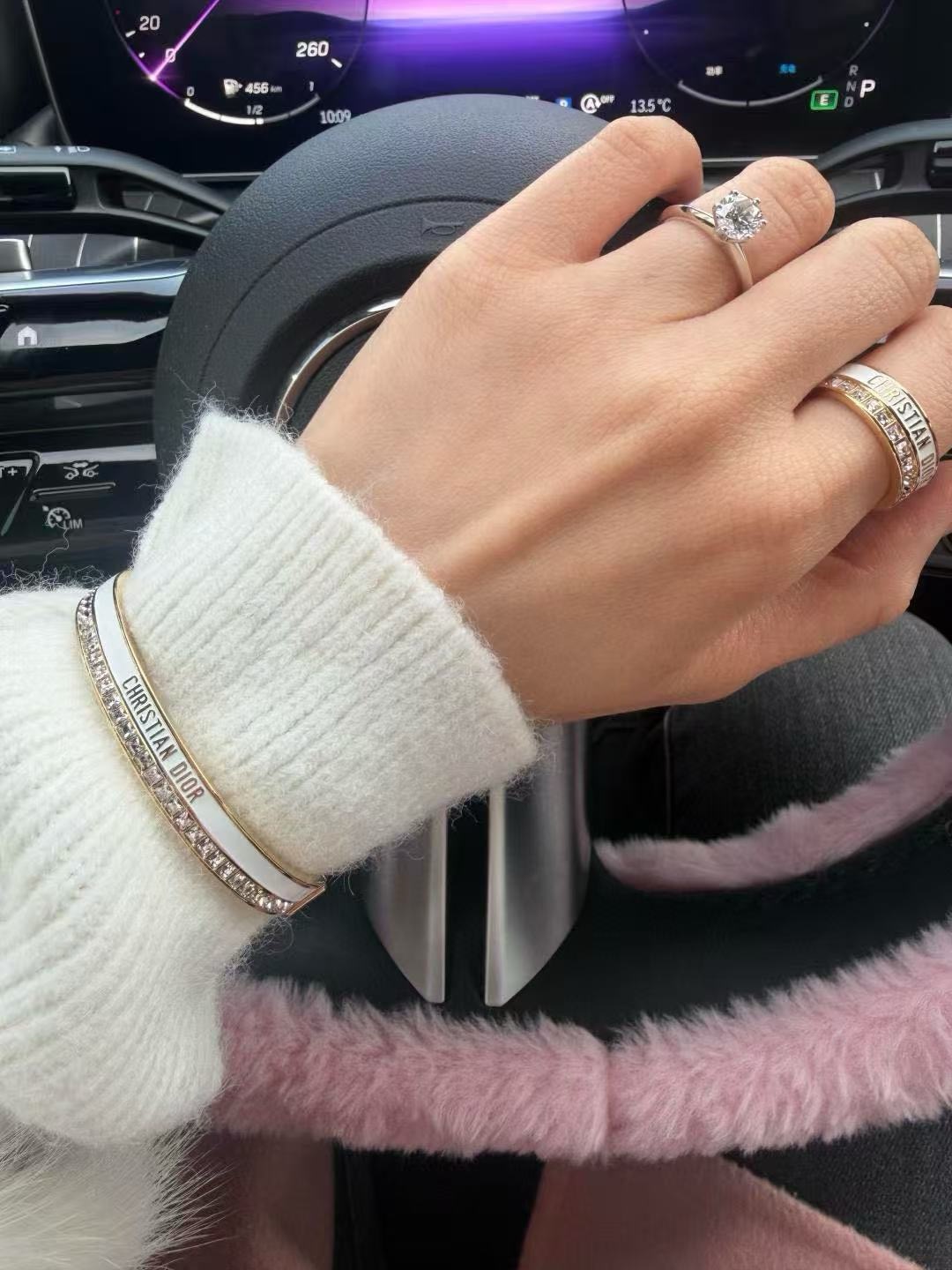 Dior CD New Night Code Bangle bracelet Gold-tone metal with clear channel-set crystals available with white or black enamel accent M