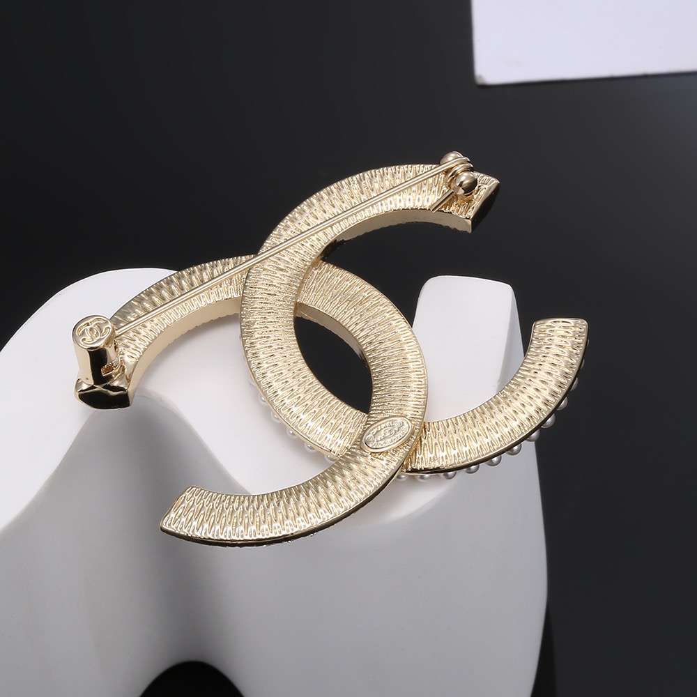 Chanel CC Logo Brooch brooch gold-tone metal white faux pearls clear crystals 3 5cm width
