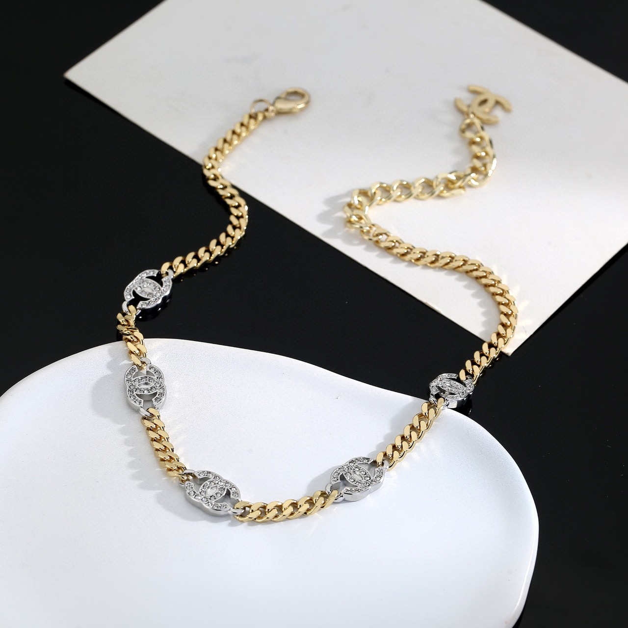 Chanel CC Crystal Cuban Chain Choker necklace gold-tone metal with silver-tone crystal-encrusted CC logos clear crystals 40cm with 5cm extender