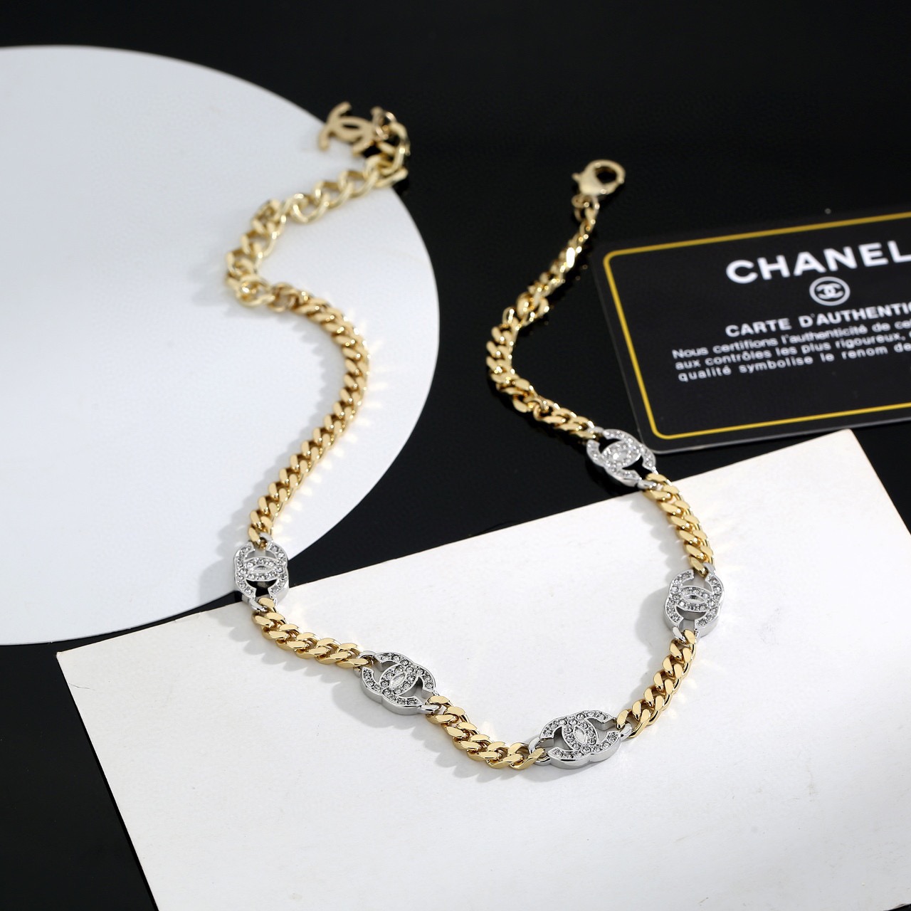 Chanel CC Crystal Cuban Chain Choker necklace gold-tone metal with silver-tone crystal-encrusted CC logos clear crystals 40cm with 5cm extender