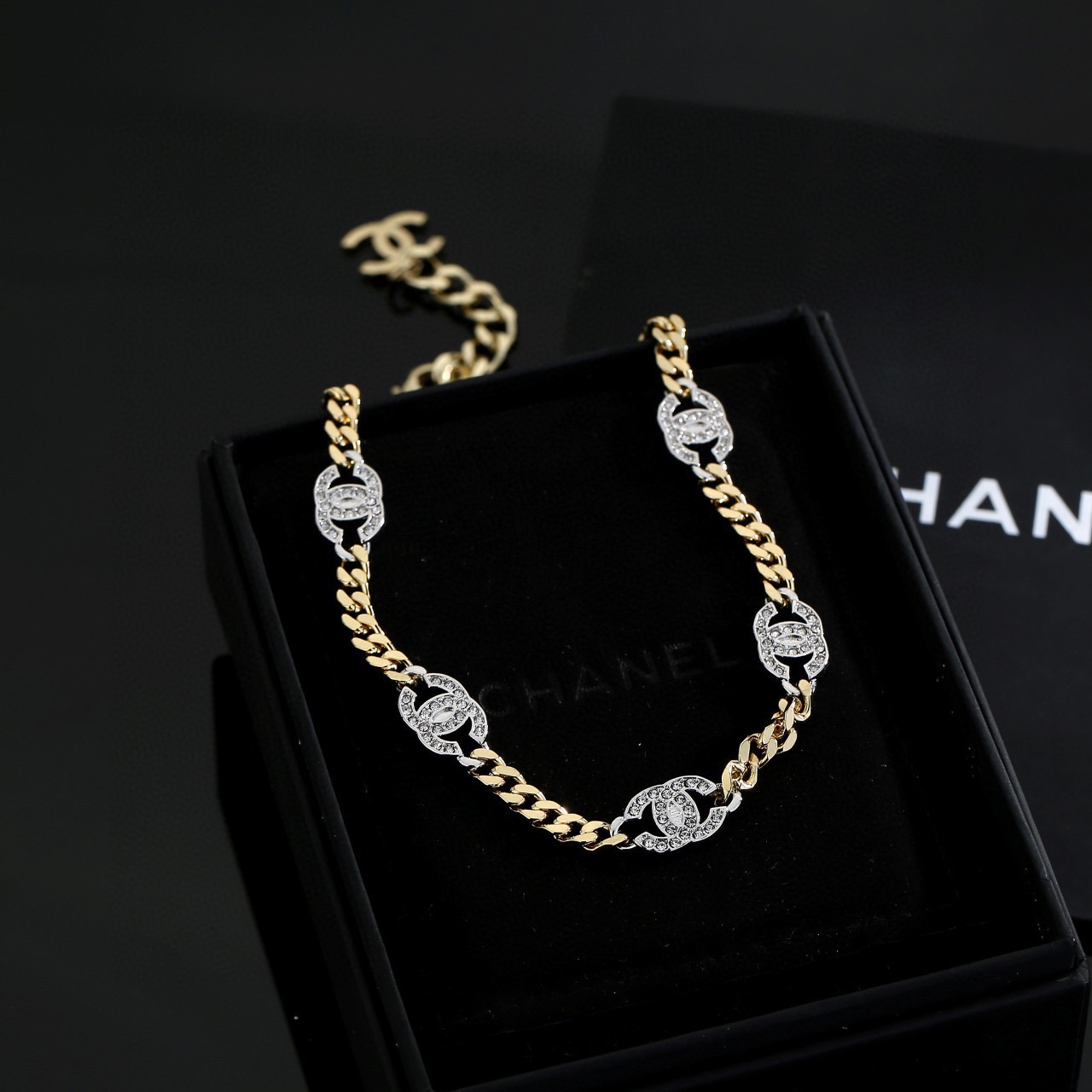 Chanel CC Crystal Cuban Chain Choker necklace gold-tone metal with silver-tone crystal-encrusted CC logos clear crystals 40cm with 5cm extender