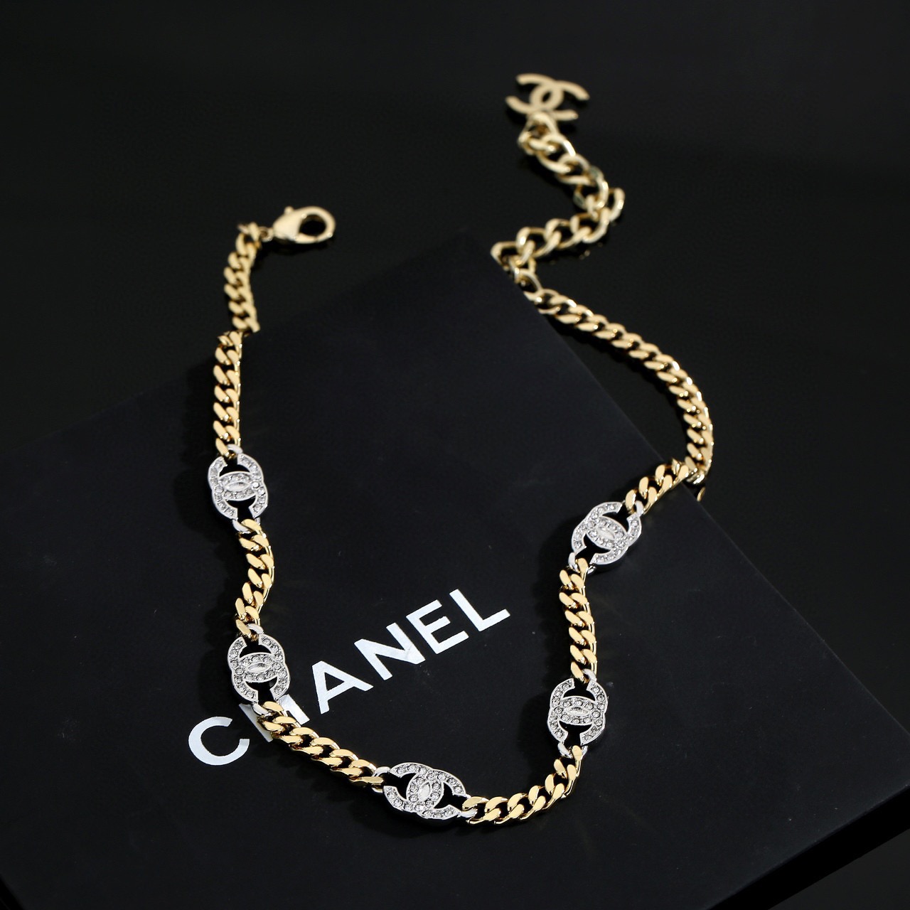Chanel CC Crystal Cuban Chain Choker necklace gold-tone metal with silver-tone crystal-encrusted CC logos clear crystals 40cm with 5cm extender