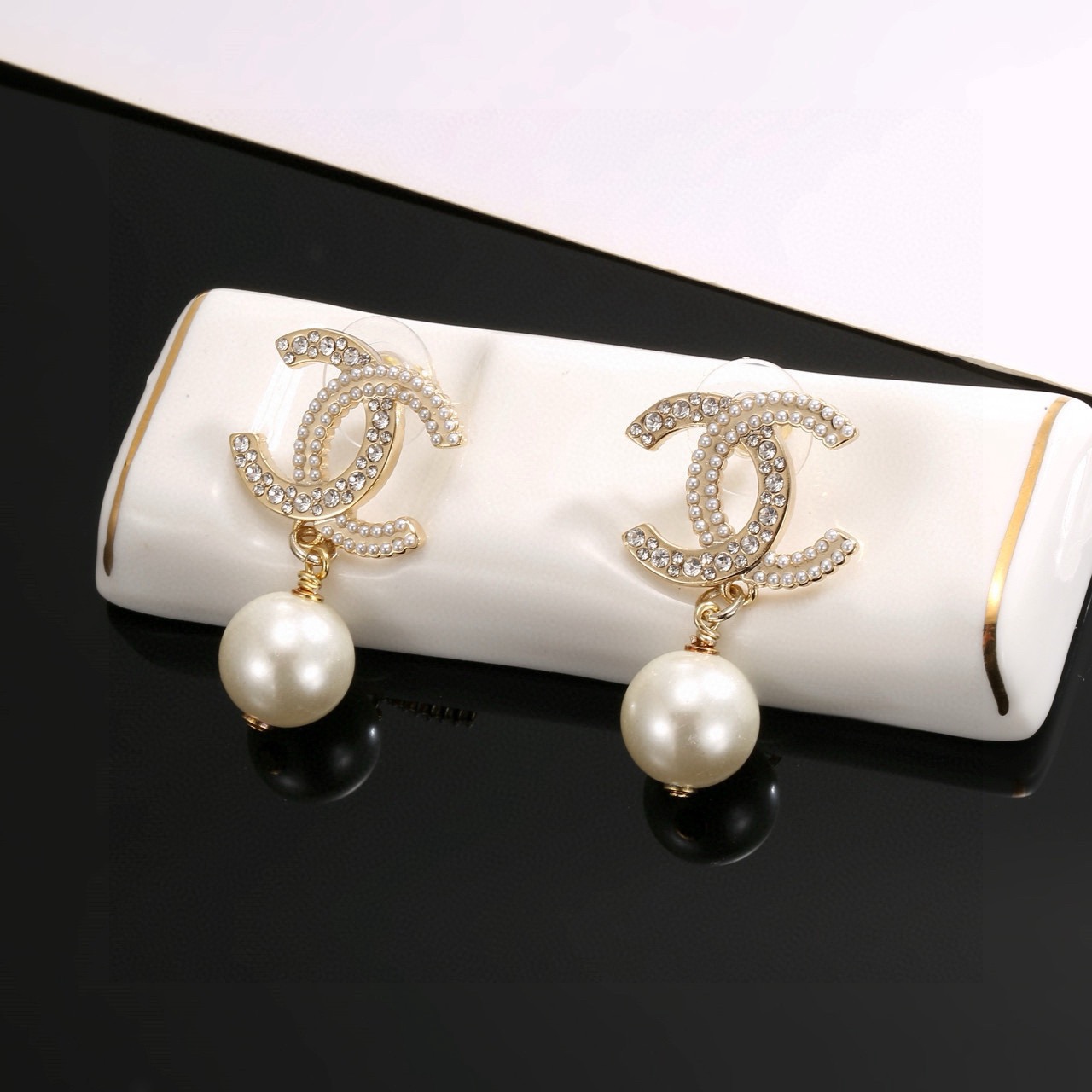 Chanel CC Logo Pearl Drop Earrings earrings Gold-tone metal with clear crystals and white faux pearls One size drop length approx 2 5cm