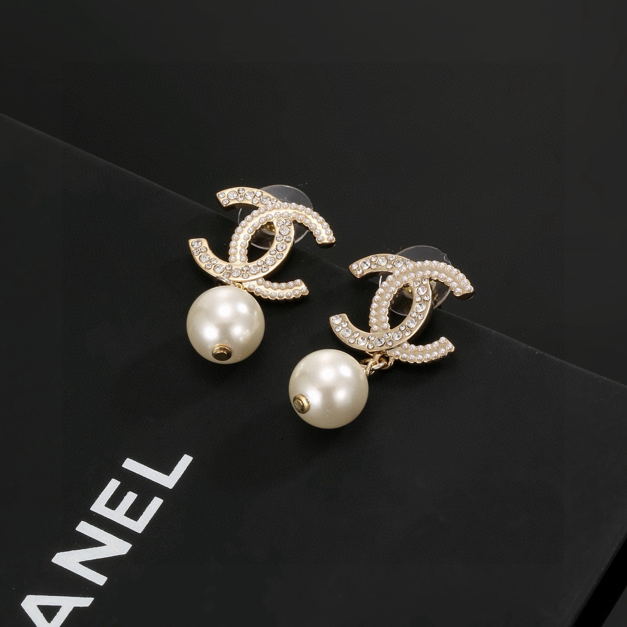 Chanel CC Logo Pearl Drop Earrings earrings Gold-tone metal with clear crystals and white faux pearls One size drop length approx 2 5cm