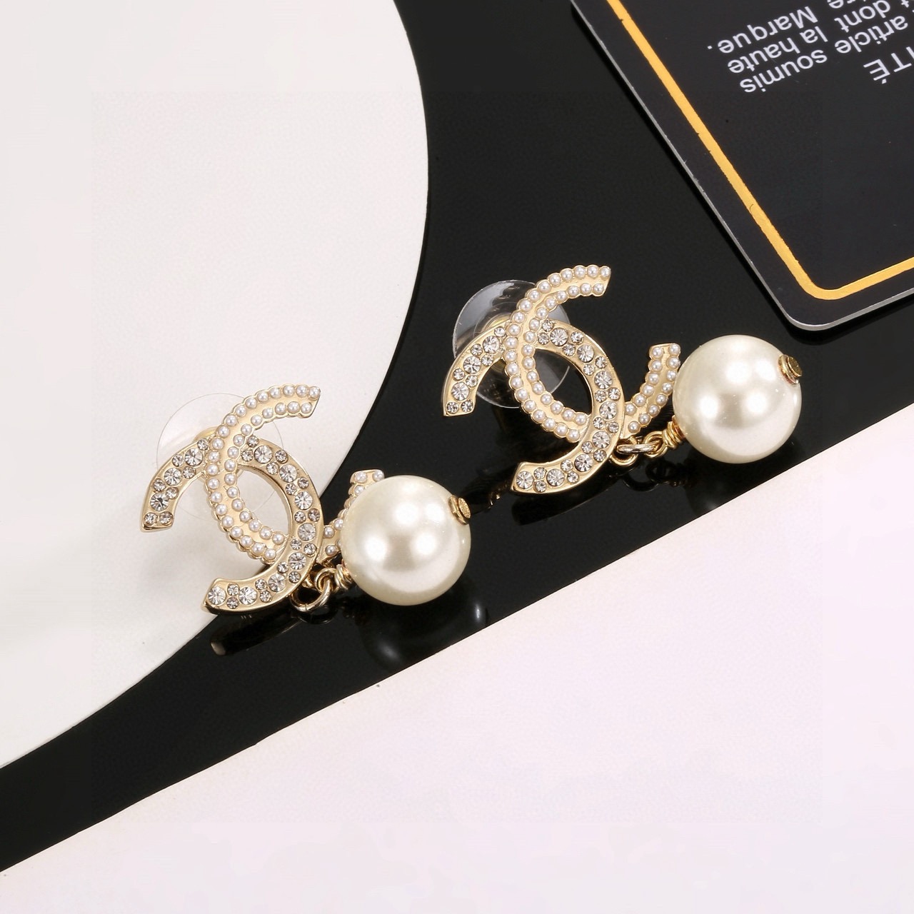 Chanel CC Logo Pearl Drop Earrings earrings Gold-tone metal with clear crystals and white faux pearls One size drop length approx 2 5cm