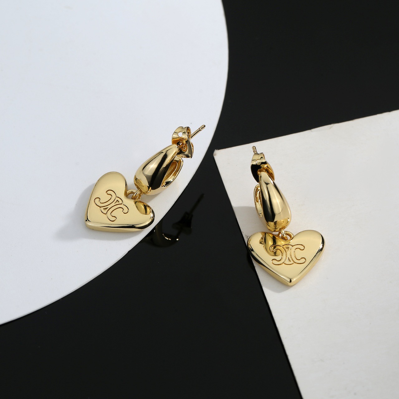 Celine Triomphe Heart Drop Hoop Earrings earrings polished gold-tone metal no accent stones 1 5cm hoop diameter 2 5cm total drop length