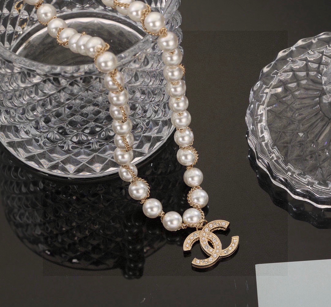 Chanel CC Pearl Charm necklace gold-tone metal white faux pearl clear crystal 42cm